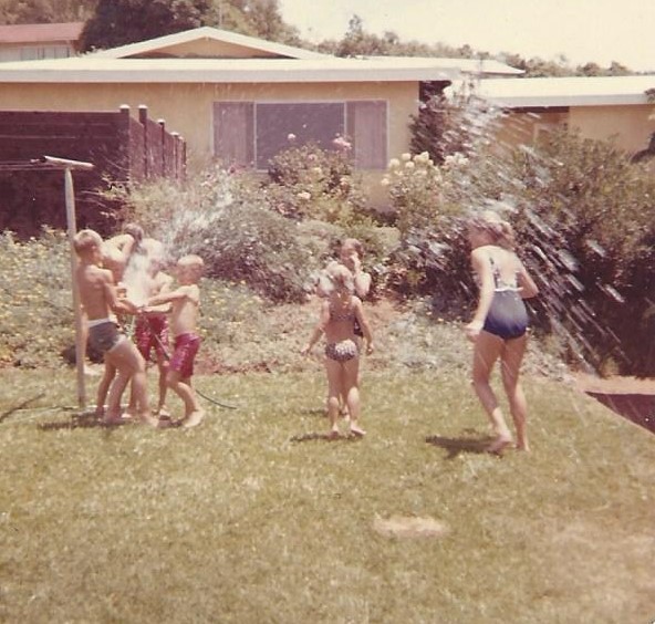 Cooling off in the sprinkler Summer 1965