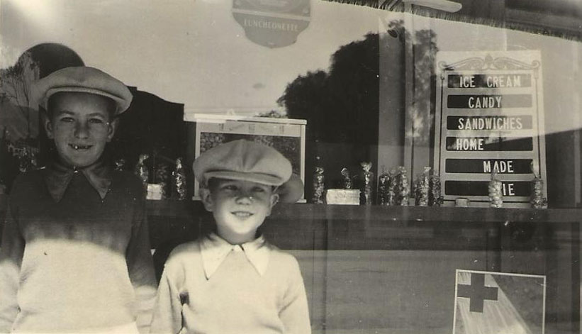 Earl and Herman in front of the store 1930